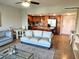 Inviting living room with an open layout to the kitchen and dining spaces at 880 Mandalay Ave # N802, Clearwater Beach, FL 33767