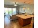 Open-concept living area that flows into the kitchen with island and views at 880 Mandalay Ave # N802, Clearwater Beach, FL 33767
