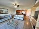 Open living space showcases tile floors, an open kitchen, and comfortable seating at 880 Mandalay Ave # N802, Clearwater Beach, FL 33767