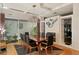 Sophisticated dining room featuring a modern chandelier, fireplace, and stylish decor at 926 Anchorage Rd, Tampa, FL 33602