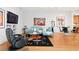 Open concept living room with modern furniture, art, and an adjacent kitchen and dining area at 926 Anchorage Rd, Tampa, FL 33602