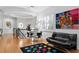 Open living area with hardwood floors, modern decor, and plenty of natural light at 926 Anchorage Rd, Tampa, FL 33602