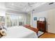 Comfortable main bedroom with hardwood floors, natural light, and ample closet space at 926 Anchorage Rd, Tampa, FL 33602