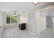 Eat-in kitchen featuring tile floors, natural light, and access to other parts of the house at 1020 Lake Avoca Dr, Tarpon Springs, FL 34689