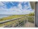 Balcony with a beautiful marsh and water view at 104 Westbrook Ct, Safety Harbor, FL 34695