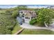 Lovely two-story home with a screened-in pool, two-car garage, and private dock at 104 Westbrook Ct, Safety Harbor, FL 34695