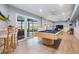 Spacious game room with a pool table and bar area at 104 Westbrook Ct, Safety Harbor, FL 34695