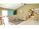 Bright living room with tan walls, tile flooring and plenty of natural light at 10440 Laval St, Spring Hill, FL 34608