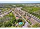 Scenic aerial view of community, highlighting a private pool oasis and convenient highway access at 11190 Windsor Place Cir, Tampa, FL 33626