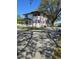 The house and driveway showcase the property's spacious paved area, providing ample parking at 11326 Brightridge Dr, Seffner, FL 33584