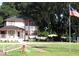 Charming home with a red trim and mature trees, nestled on a well-maintained lot at 11326 Brightridge Dr, Seffner, FL 33584