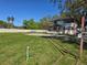 Charming two-story home featuring a covered porch, a spacious yard, and visible property boundaries at 11326 Brightridge Dr, Seffner, FL 33584