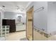 Bathroom featuring gray walls, tile flooring, mosaic trim, and a walk-in shower with mosaic surround at 11327 Carter Grove Ln, Thonotosassa, FL 33592