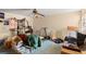 This bedroom shows stored items and exercise equipment at 11327 Carter Grove Ln, Thonotosassa, FL 33592