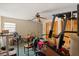 A bedroom space shows exercise equipment and stored belongings at 11327 Carter Grove Ln, Thonotosassa, FL 33592
