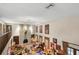 Living room with view of the stone fireplace from upstairs at 11327 Carter Grove Ln, Thonotosassa, FL 33592