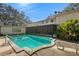 A beautiful single-Gathering house with a large in-ground pool with stainless steel railings at 11327 Carter Grove Ln, Thonotosassa, FL 33592