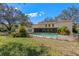 A beautiful single-Gathering house with a fenced pool and an enclosed back porch at 11327 Carter Grove Ln, Thonotosassa, FL 33592