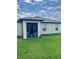 Rear exterior of house, showing screened in porch and lush lawn at 12115 Smoky Emerald Ter, Parrish, FL 34219