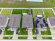 Aerial view showcases fenced yards with patios and landscaped gardens in a community at 12635 Tannencrest Dr, Riverview, FL 33579