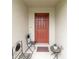 Covered front entrance with outdoor seating for a welcoming first impression at 12635 Tannencrest Dr, Riverview, FL 33579
