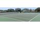 Exterior shot of the community tennis court; the court is fenced and well-maintained at 12635 Tannencrest Dr, Riverview, FL 33579