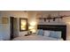 Bedroom with a comfy bed, airplane art, and natural light from the window at 133 S Sherrill St # 133, Tampa, FL 33609