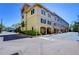 Charming townhome featuring a private garage, lush landscaping and well-maintained brick paved streets at 133 S Sherrill St # 133, Tampa, FL 33609