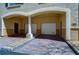 Attached two-car garage with a unique architectural design and ample parking space at 133 S Sherrill St # 133, Tampa, FL 33609