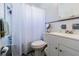 Cozy bathroom with a tub/shower combination, toilet, and vanity at 1740 Grove Dr, Clearwater, FL 33759