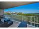 Relaxing balcony with comfortable seating and picturesque views of the bay and surrounding landscape at 19451 Gulf Blvd # 301, Indian Shores, FL 33785