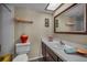 Clean bathroom with a sink, mirror, and shower stall at 19451 Gulf Blvd # 301, Indian Shores, FL 33785