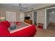 Bedroom featuring a large bed, closet, and access to the bathroom at 19451 Gulf Blvd # 301, Indian Shores, FL 33785
