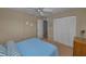 Bedroom featuring a closet and comfortable carpet flooring at 19451 Gulf Blvd # 301, Indian Shores, FL 33785