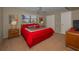 Cozy bedroom featuring a large window and comfortable carpet flooring at 19451 Gulf Blvd # 301, Indian Shores, FL 33785