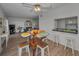 Open floorplan of living room, dining area and breakfast bar with natural light at 19451 Gulf Blvd # 301, Indian Shores, FL 33785