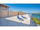 Beautiful roof deck with two lounge chairs overlooks the waterway at 19451 Gulf Blvd # 301, Indian Shores, FL 33785