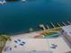 Beautiful rooftop deck with lounge chairs, picnic table, and bay views at 19451 Gulf Blvd # 301, Indian Shores, FL 33785