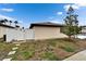 Serene backyard featuring a privacy fence, mature tree, and lush green space, great for relaxation at 24862 Us Highway 19 N # 1701, Clearwater, FL 33763