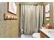 Bathroom offering a shower and a wooden vanity with olive green accents at 24862 Us Highway 19 N # 1701, Clearwater, FL 33763