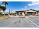Well-maintained home exterior showcasing ample parking and a neatly landscaped front yard at 24862 Us Highway 19 N # 1701, Clearwater, FL 33763