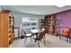 Cozy game room with bookshelves, a table and chairs, providing a comfortable space for reading or games at 24862 Us Highway 19 N # 1701, Clearwater, FL 33763