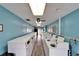 Well-maintained laundry room with multiple modern washing machines, providing convenience for residents at 24862 Us Highway 19 N # 1701, Clearwater, FL 33763