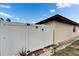 Sturdy white privacy fence ensuring seclusion and security for this home's backyard at 24862 Us Highway 19 N # 1701, Clearwater, FL 33763