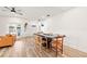 Open dining room area featuring wood floors and shelving at 2523 W Abdella St, Tampa, FL 33607