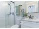 Modern bathroom featuring a tiled shower, toilet, and marble countertop vanity at 2835 3Rd N Ave, St Petersburg, FL 33713