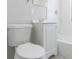 Bright bathroom featuring a white vanity, toilet, mirror and shower with white subway tile at 2835 3Rd N Ave, St Petersburg, FL 33713