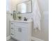 This bathroom has a white vanity and a large, framed mirror at 2835 3Rd N Ave, St Petersburg, FL 33713