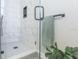 Marble tile shower with glass door in modern bathroom at 2835 3Rd N Ave, St Petersburg, FL 33713