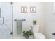 Bright bathroom with glass shower, white toilet, and minimalist decorations for an airy feel at 2835 3Rd N Ave, St Petersburg, FL 33713